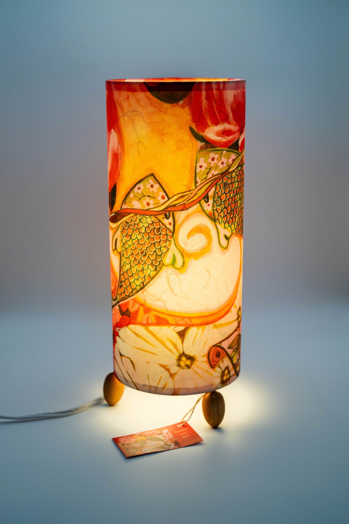 6813756fc324346626b37929_peony-and-koi-lit-3_1781653161592.jpg