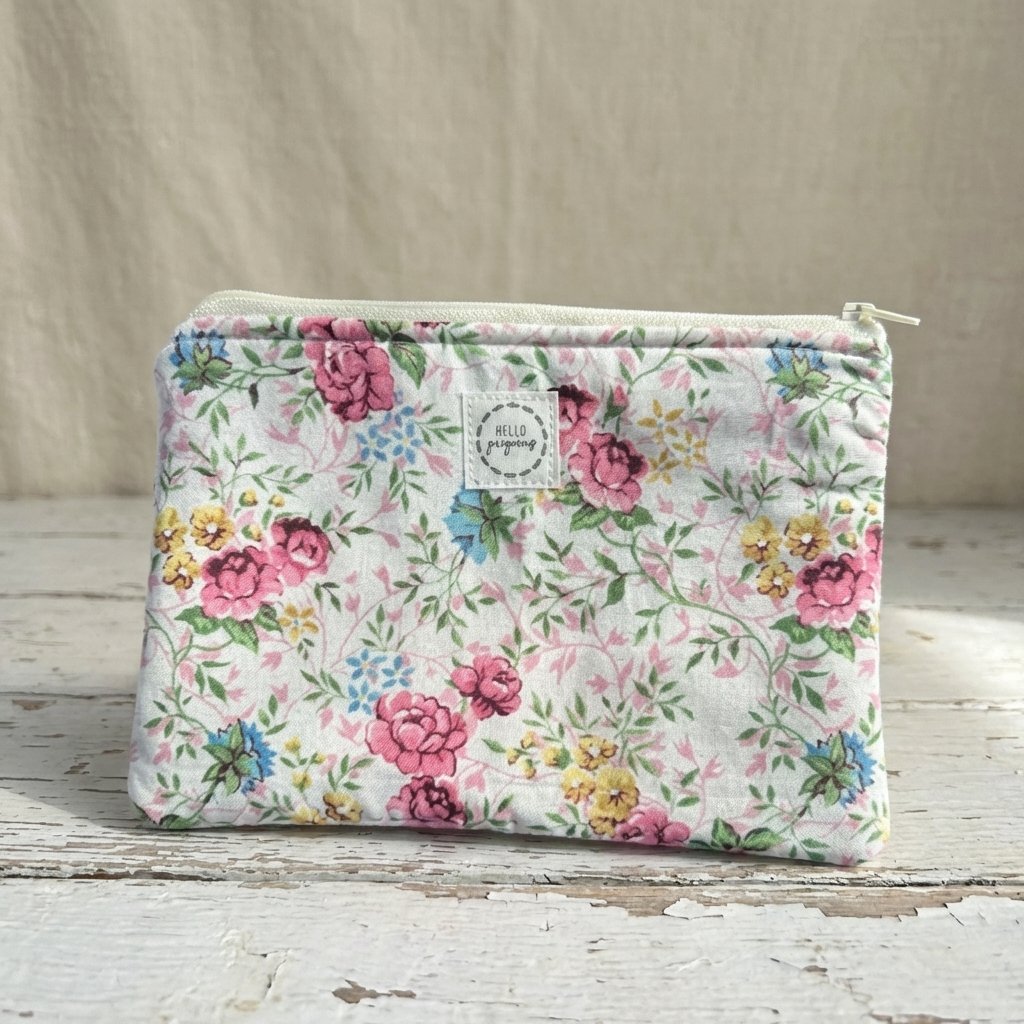 6813756fc324346626b37929_pink-flowered-pouch2_1773721601168.jpeg